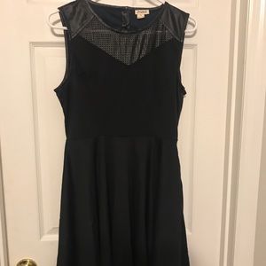 Black dress with feaux leather detail